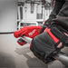 Person holding a Milwaukee tool