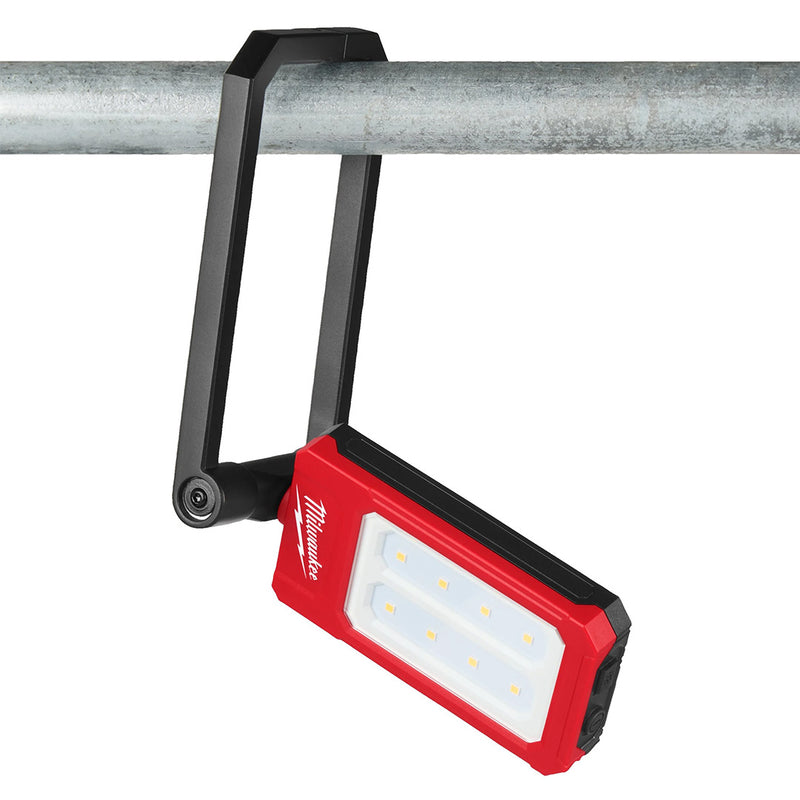 Milwaukee IR FFL flood light hanging from pipe using integrated hook