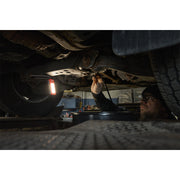 Milwaukee IR FFL folding flood light being used under a vehicle